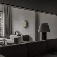 Dimly lit living room with lamps and minimalist furniture